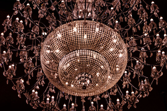 The chandelier on the ceiling