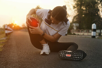 Ankle knee accident in sport exercise running jogging.low key lighting.