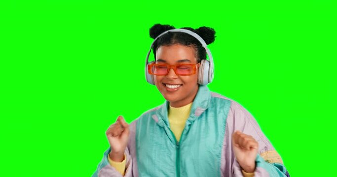 Green screen headphones, music and happy woman dance to podcast song, radio sound or listen to wellness audio track. Chroma key person, dancing or vintage dancer streaming on mockup studio background