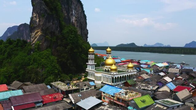 Mosque with golden spires, Ko Panyi island floating village, Thailand.