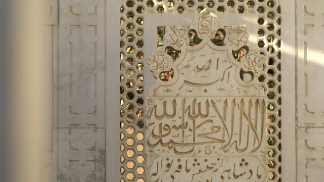 Reveal pan of decoration text on Tomb of Babur at Babur Gardens, Kabul