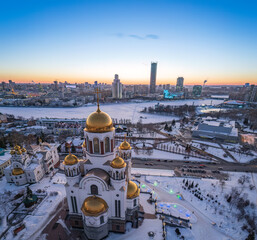 Winter Yekaterinburg and Temple on Blood in beautiful blue clear sunset. Aerial view of...