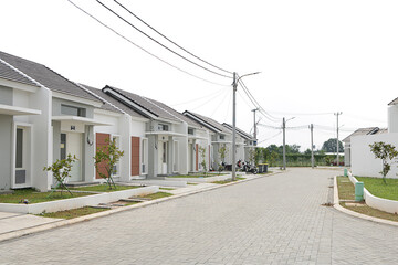 Fototapeta na wymiar new housing with white walls with cobbled streets, modern residential houses