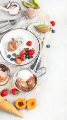 Ice cream assortment on neutral background.
