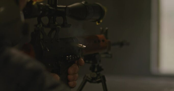 FN FAL combat rifle failing to eject fired casing. Failure to extract a casing after a fired shot is a typical firearm malfunction