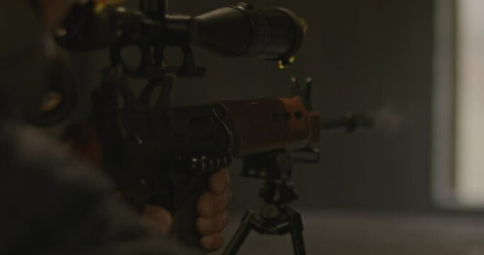 FN Fal combat rifle shooting in slow motion and ejecting shell casing