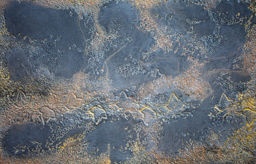 Multicolored background of decorative plaster with abstract spots. Unusual color wall texture with beautiful patterns, creative surface background. Finishing coating for building cladding.