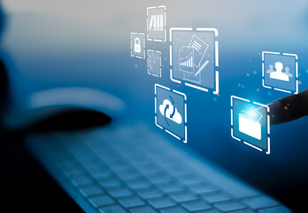 Businesswoman using a computer to document management concept, online documentation database and digital file storage system/software, records keeping, database technology, file access,