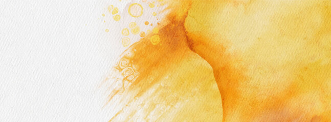 Abstract gold and yellow watercolor paint background.