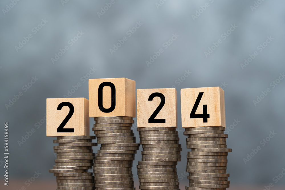 Poster wooden block cube from 2024 on coins stacking for setup objective target business cost and budget pl