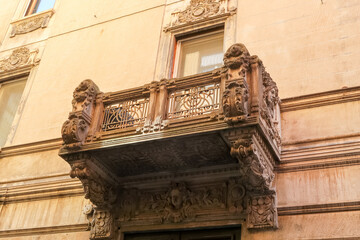 Pavia balcony antique worked workmanship detail near house building panorama