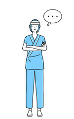 腕を組んで考える頭に包帯を巻いた女性入院患者