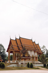 Fototapeta premium Buddhism Religion Golden Temple Image Sough-East Asian Praying Statue