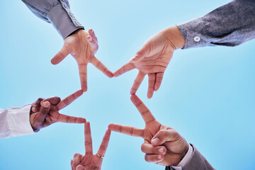 Business people, peace and hands in team building and star shape for collaboration or trust below blue sky. Hand of group touching fingers for sign, huddle or support in teamwork, solidarity or unity