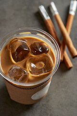 Ice coffee and cinnamon sticks