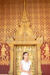 Portrait of An Asian Woman at Wat Sene Souk Haram ,Luang Prabang, LAOS
