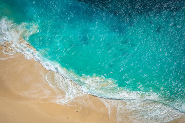 aerial view of clear waters beach in bali, indonesia