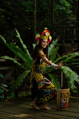 Fototapeta na wymiar A Borneo lady showcasing the beauty of her culture through her stunning traditional clothing