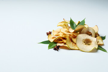 Concept of tasty food, dried apple chips, space for text