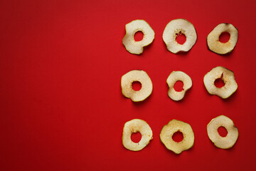 Concept of tasty food, dried apple chips, space for text