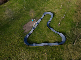 bike path in the car park Pumping (moving up and down) is used instead of pedaling and bouncing to...