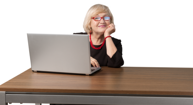Grey hair woman sitting on the table near laptop in thoughtful pose, isolated on white - Powered by Adobe
