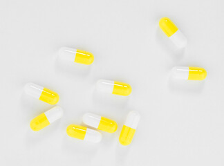 White yellow medical pills. Medical and Healthcare Concept, top view with copy space.