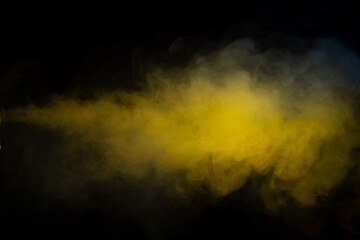 Yellow steam on a black background.