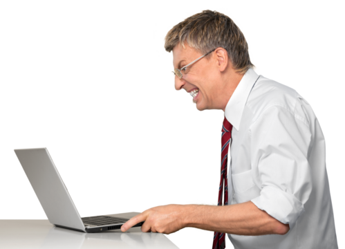 Frustrated businessman using a laptop