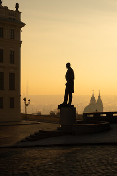 Silhouette of the statue of T.G. Masaryk on Hradčansk&eacute; n&aacute;měst&iacute; during a beautiful morning sunrise. Prague, the capital of the Czech Republic
