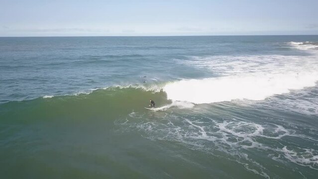 aerial view of Surfer in Coxos point break surf spot beach in Ericeira Portugal
