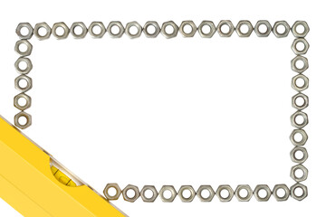Frame made of iron nuts and a building level on a white background.