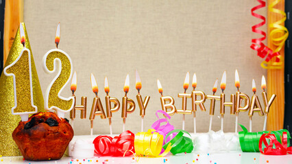 Happy birthday background with golden candles and decorations with candles burning number  12....