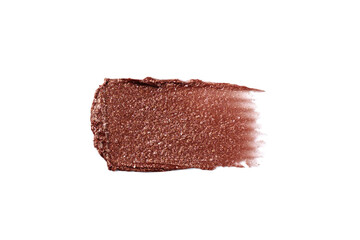 Wet bronzer, eye shadow smear isolated on white background. Bronze glittering eye shadow color swatch.