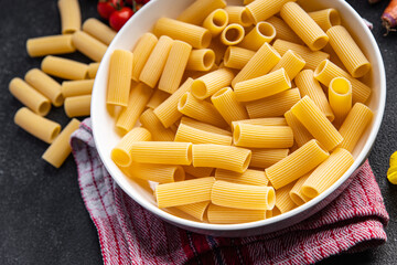 raw pasta rigatoni ingredient meal food snack on the table copy space food background rustic top view