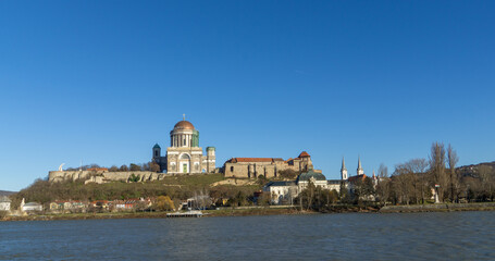 Fototapeta na wymiar Esztergom with a bright blue sky on the Danube in Hungary