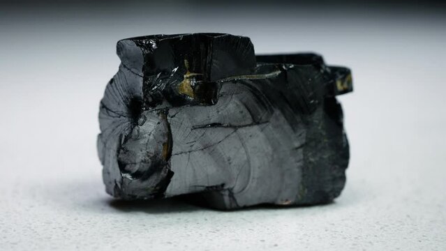 4k 30p Russian Elite Shungite Crystal Stone. Macro nature crystal gemstone high-quality product shots.