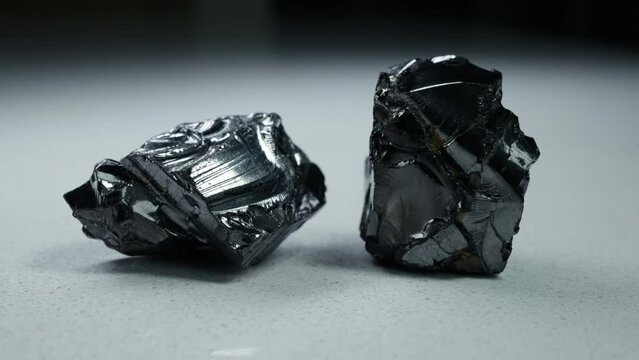 4k 30p Russian Elite Shungite Crystal Stone. Macro nature crystal gemstone high-quality product shots.