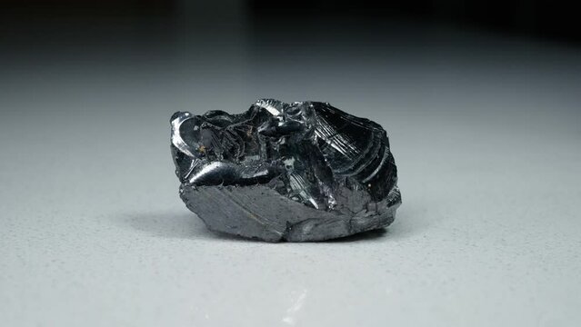 4k 30p Russian Elite Shungite Crystal Stone. Macro nature crystal gemstone high-quality product shots.