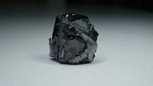 4k 30p Russian Elite Shungite Crystal Stone. Macro nature crystal gemstone high-quality product shots.