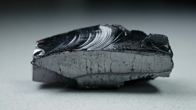 4k 30p Russian Elite Shungite Crystal Stone. Macro nature crystal gemstone high-quality product shots.