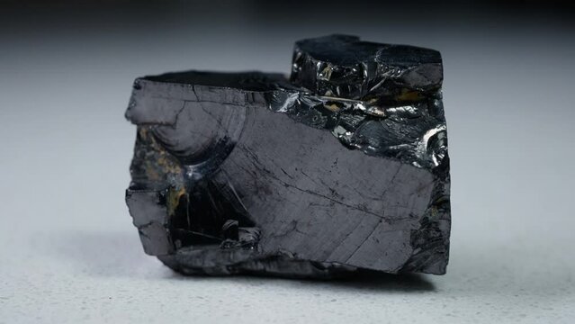 4k 30p Russian Elite Shungite Crystal Stone. Macro nature crystal gemstone high-quality product shots.