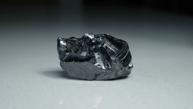 4k 30p Russian Elite Shungite Crystal Stone. Macro nature crystal gemstone high-quality product shots.