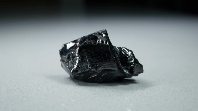 4k 30p Russian Elite Shungite Crystal Stone. Macro nature crystal gemstone high-quality product shots.