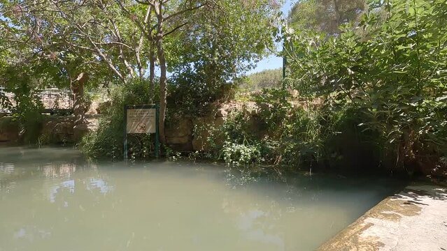 A beautiful stream of flowing water in the Ein Hamad nature reserve in Jerusalem - Israel