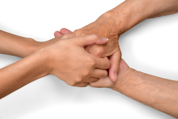 Young Woman's Hands Touching and Holding an Old Woman's Hands