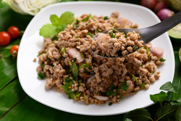 Local Thai food, Spicy minced pork salad (Larb Moo)