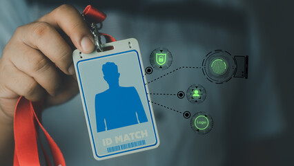 Close up of office man using ID staff card to scan for entering a username and password of data....