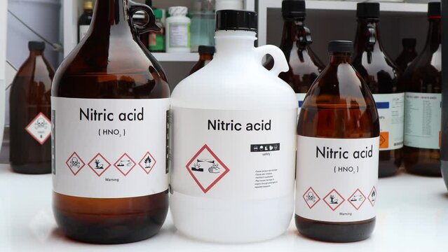 Nitric acid, Hazardous chemicals and symbols on containers, chemical in industry or laboratory 