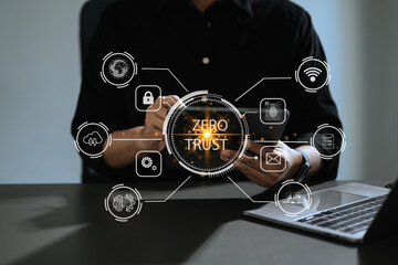 Zero trust security concept Person using computer and tablet with zero trust icon on virtual screen of Data businesses.in modern office